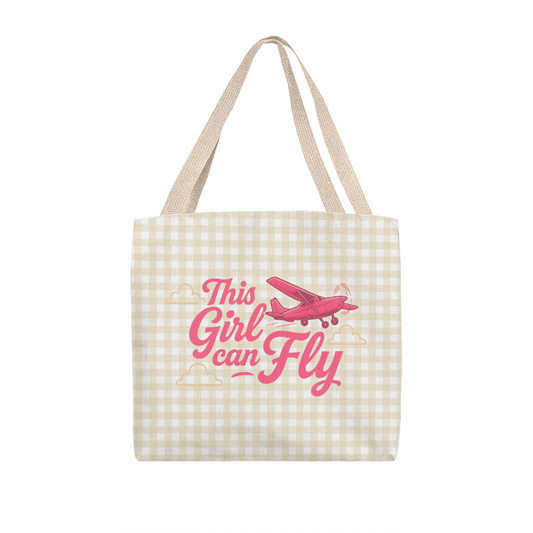 Khaki plaid tote bag with a salmon and tan This Girl Can Fly text designs and a small aircraft.